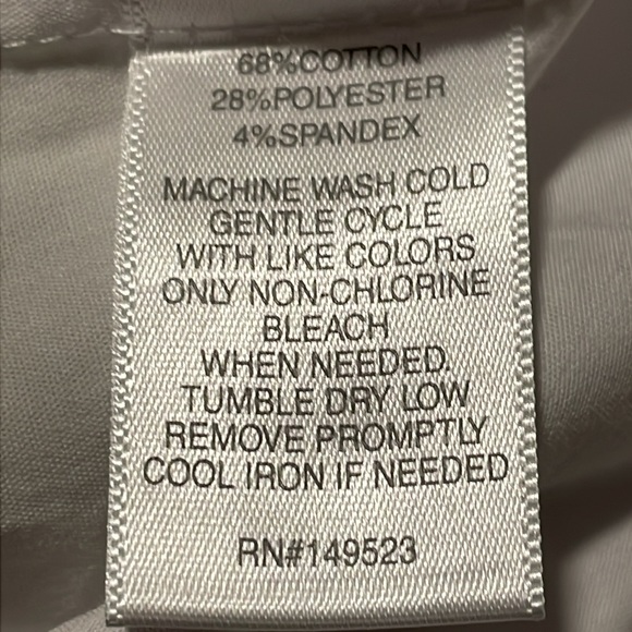 Bright White sleeveless button down blouse with hemline detail. - Picture 6 of 6